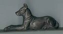 metal Great Dane figure on brass ruler